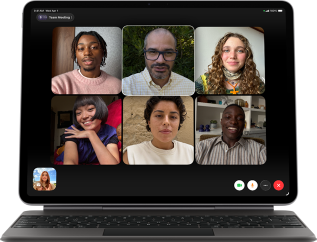 iPad Air fixé à un Magic Keyboard, coloris noir, écran affichant un appel FaceTime en groupe